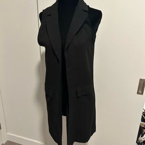 Nice throw over for the office or going out to dinner. Black. Size small.